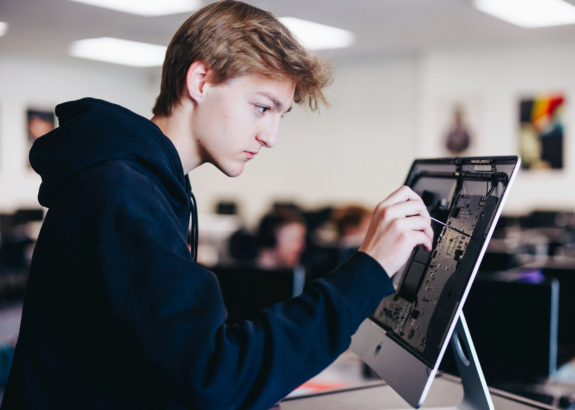 Students practicing programming basics on laptops - Learn coding fundamentals with expert guidance at BitLearners